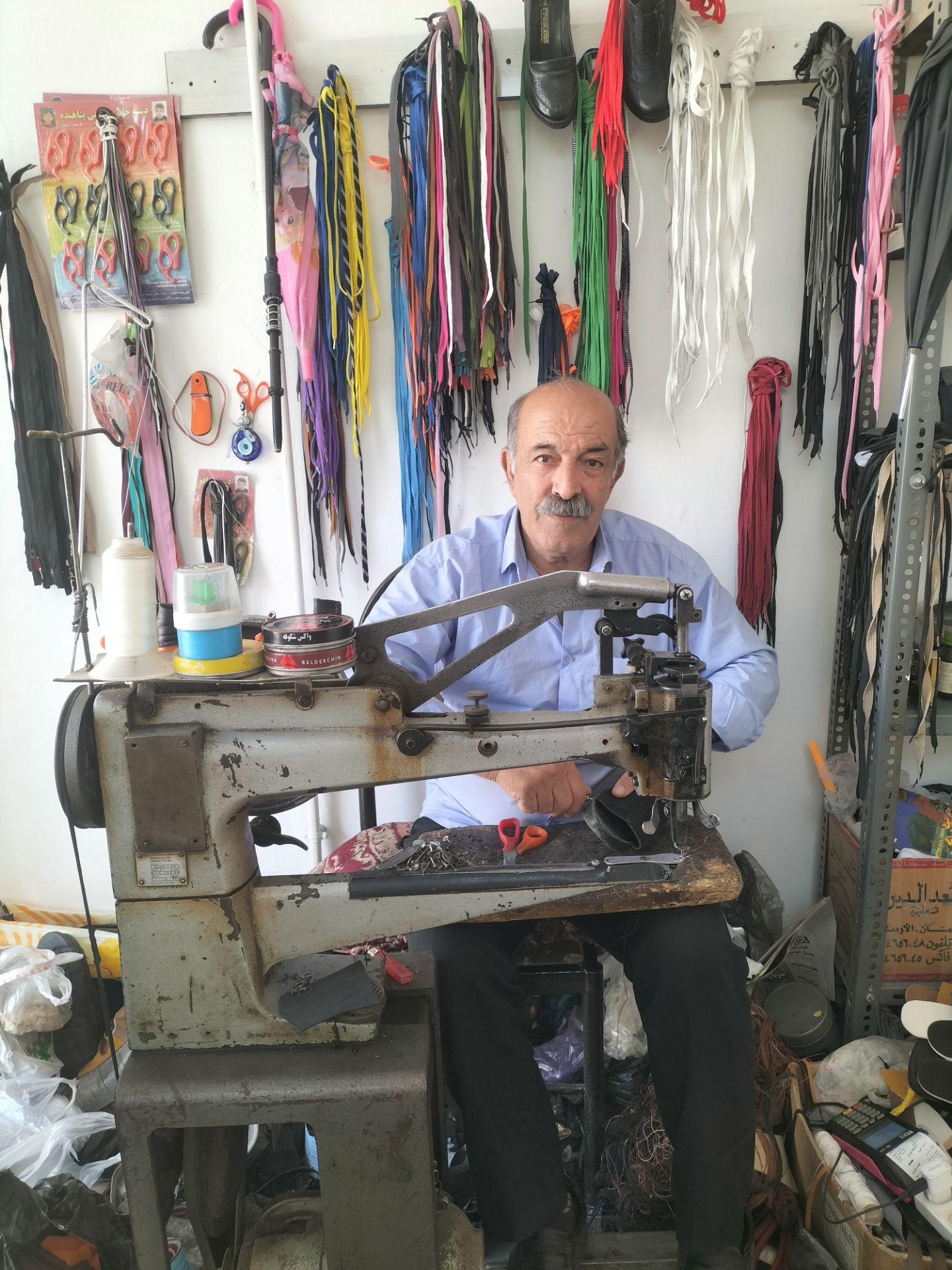 تعمیر کیف و کفش، مغازه شکوفه دولت‌آباد،